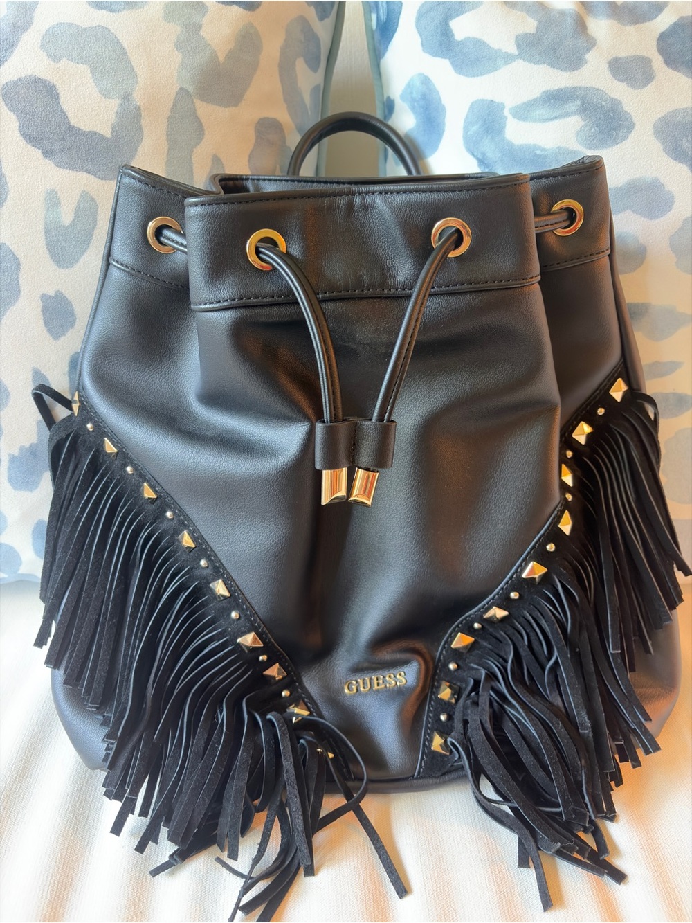 GUESS Black Fringe Drawstring Backpack with Gold Studs